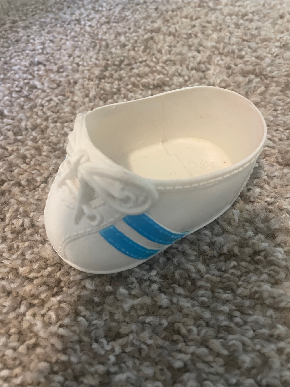 Vintage 1980s Cabbage Patch Kid blue striped sneaker.